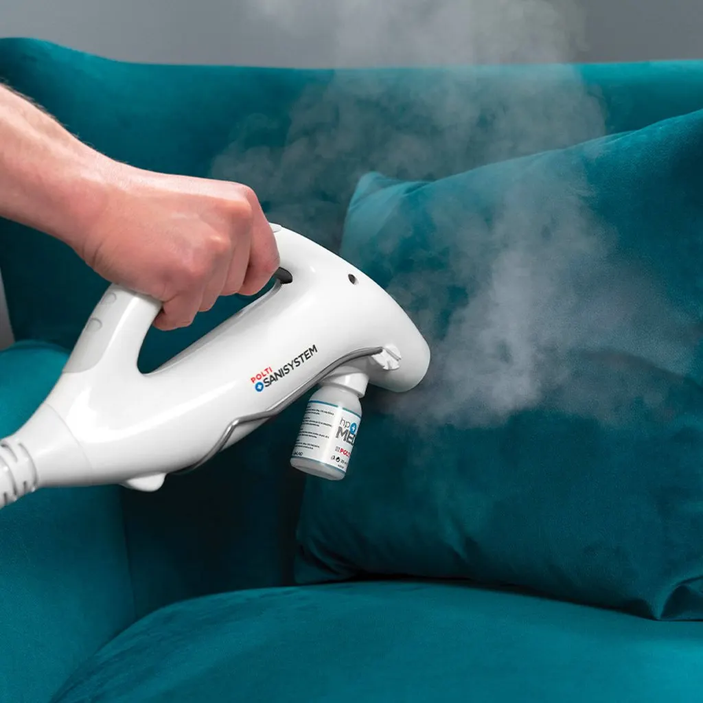 Steam treatment being applied to a sofa seam for bed bugs